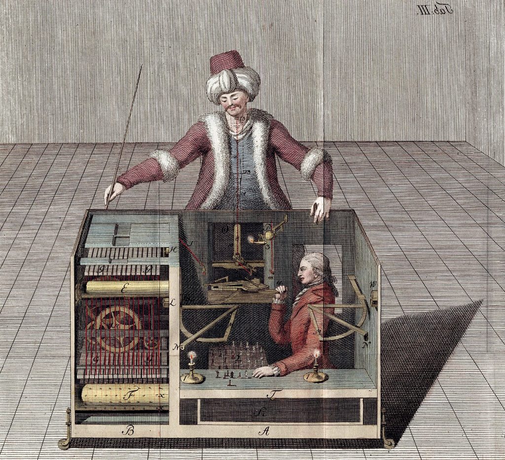 Coloured engraving of an alleged automaton, dressed as a 'Turk', standing behind a substantial piece of furniture, facing an imaginary chess opponent, but the interior is exposed, illustrating the way the automaton might be operated by a hidden human being, using mirrors and levers.